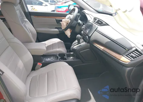 2019 Honda Cr-V Touring z USA, uszkodzony, nr VIN 7FARW2H99KE030661